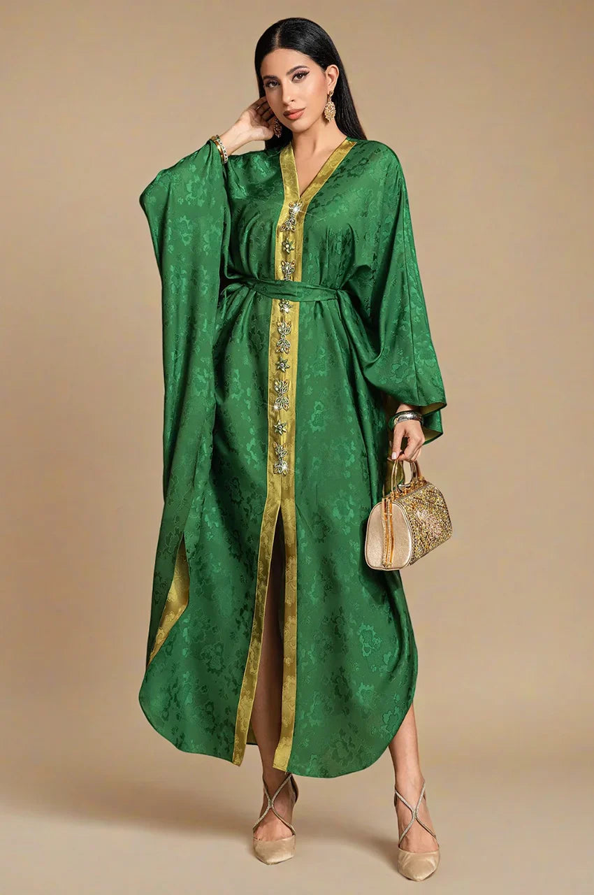 Full front view of Selora green embellished silk kaftan with gold trim and hand-embellished detailing