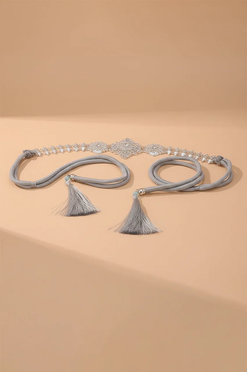 Full view of Naylara's Silver Geometric Rhinestone Spike Link Chain Belt with adjustable rope ties.