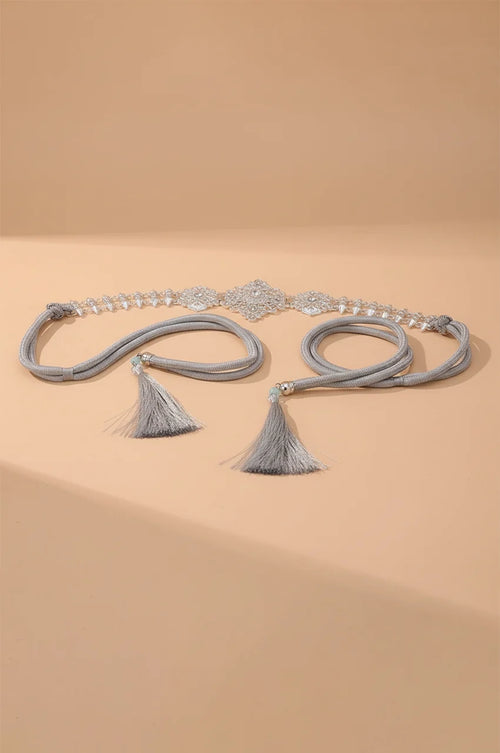 Full view of Naylara's Silver Geometric Rhinestone Spike Link Chain Belt with adjustable rope ties.