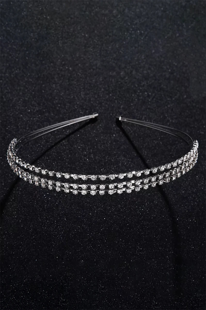 Top-down angle of silver crystal headband showing parallel separation.