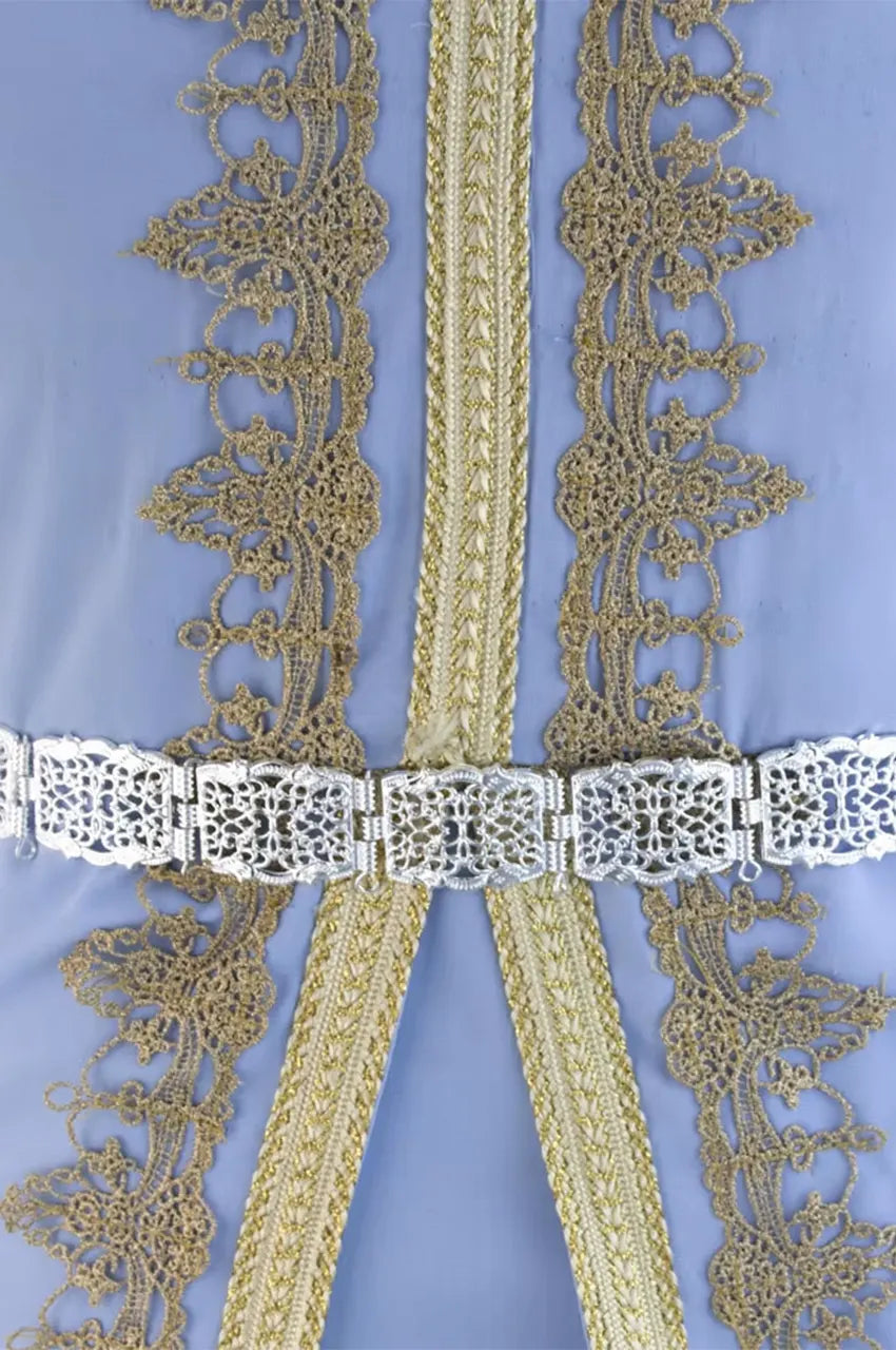 Silver square plate belt styled on a blue kaftan dress showing waist definition.