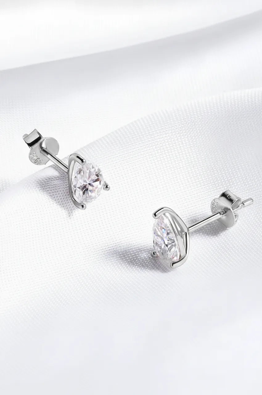 Detail shot of silver pear stud earring showing post and butterfly backing.