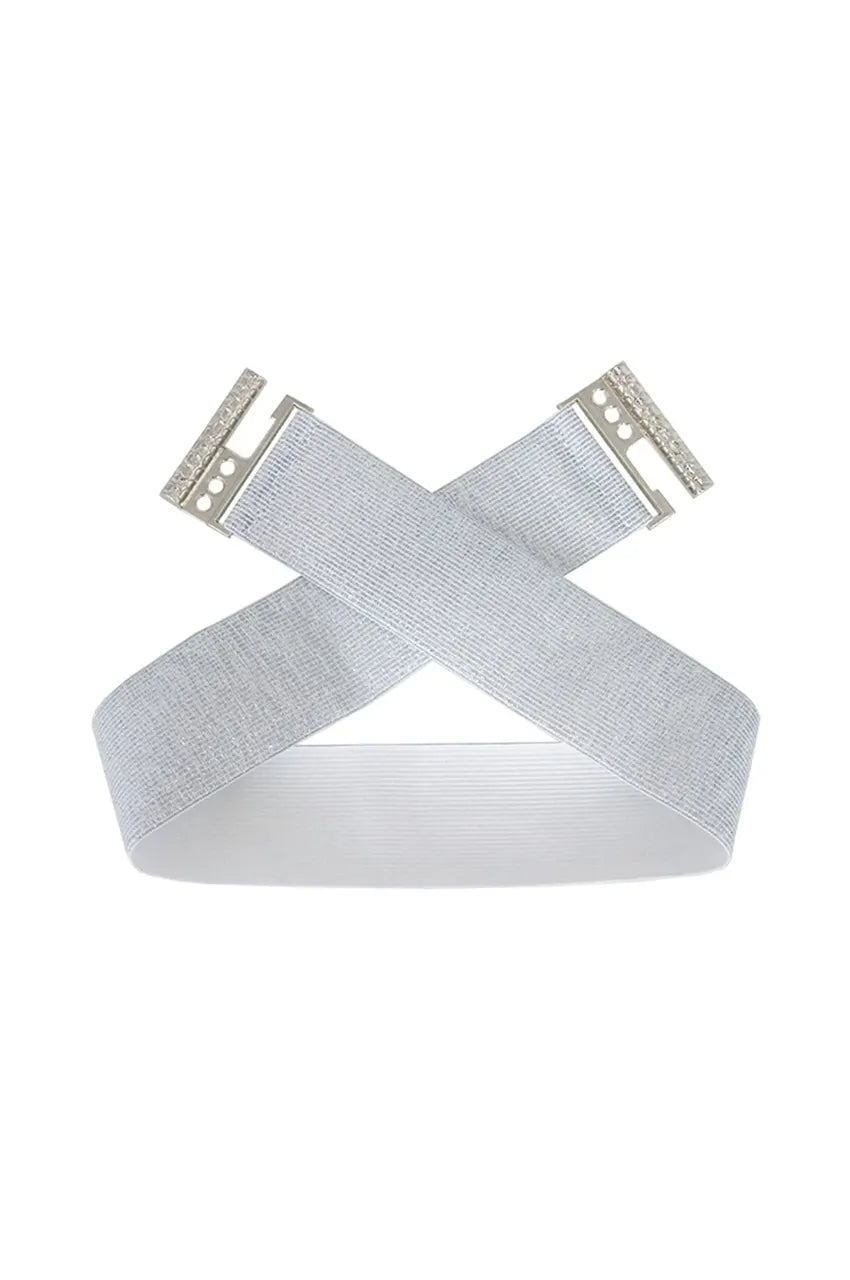Silver glitter wide stretch belt folded to show flexible construction and soft white interior lining.