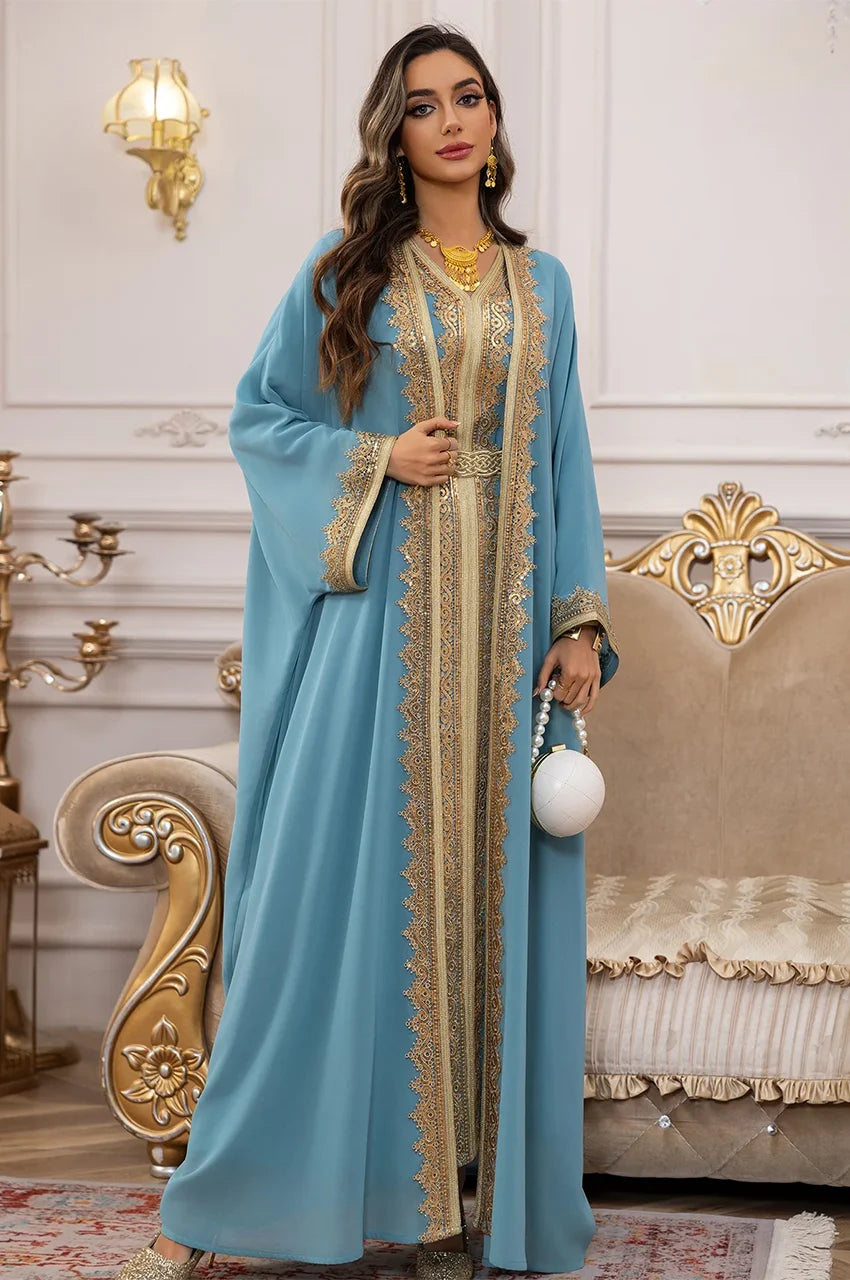Full view of the NAYRA sky blue kaftan highlighting the wide sleeves and gold trim cuffs.