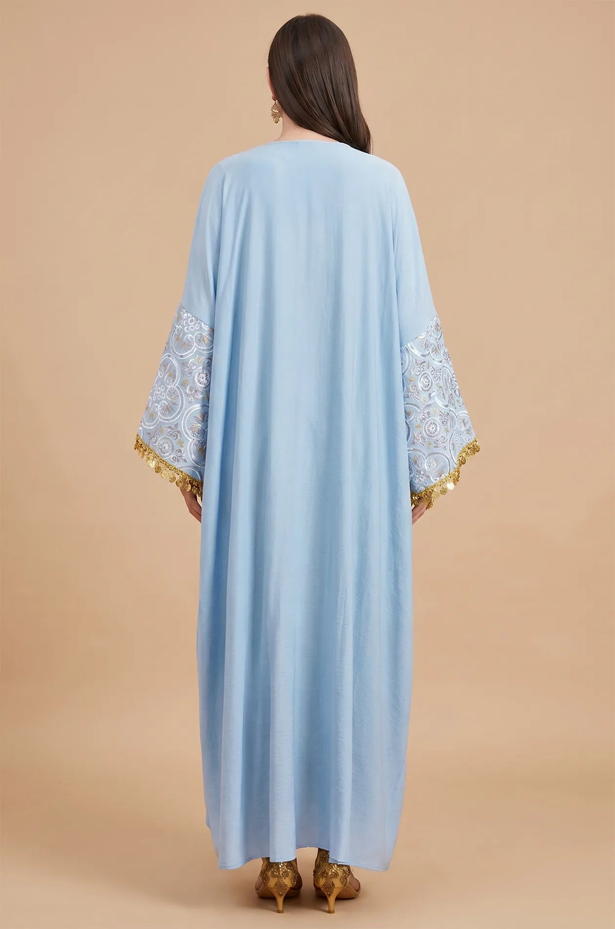 Rear view of the sky blue Novae crepe kaftan showing the fluid drape of the premium fabric.