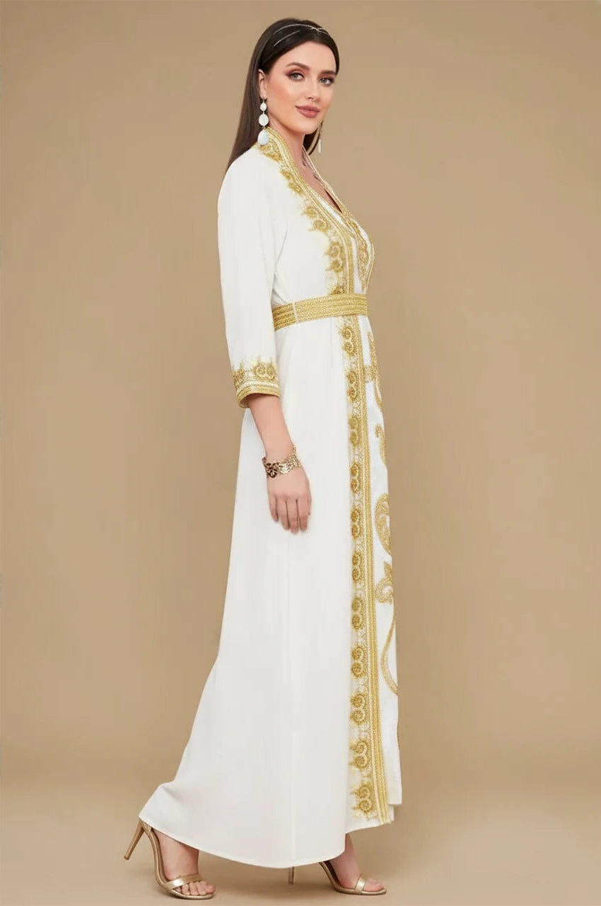 Profile view of the SORAI white chiffon kaftan dress highlighting the belted waist.