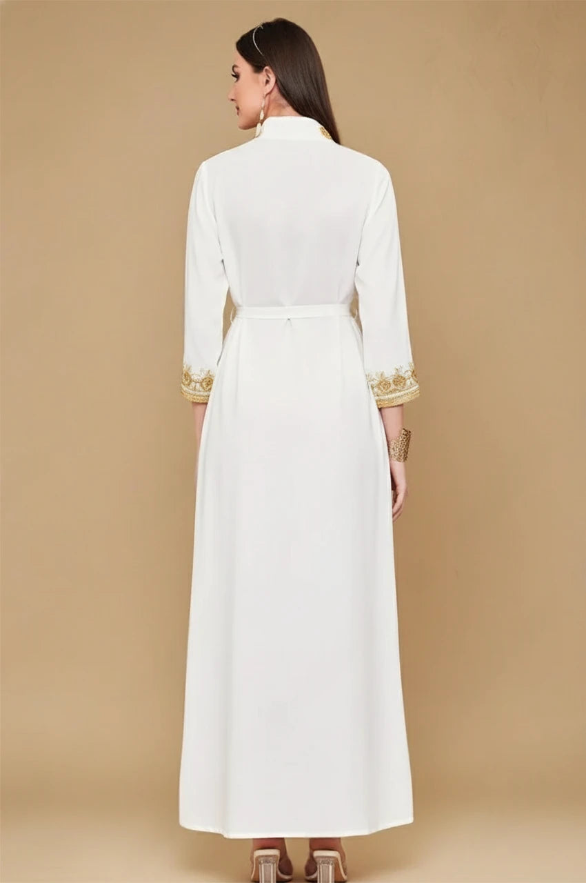 Back view of the SORAI white and gold chiffon kaftan dress showing the full-length silhouette.