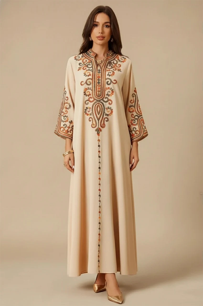 Full front view of beige Soraya modern Moroccan kaftan with traditional multicolor embroidery