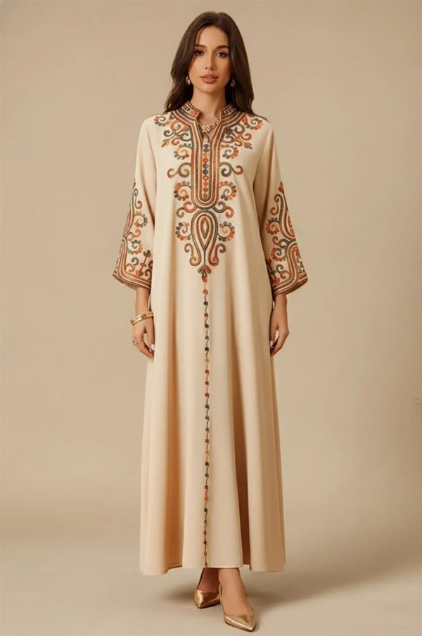 Full front view of beige Soraya modern Moroccan kaftan with traditional multicolor embroidery