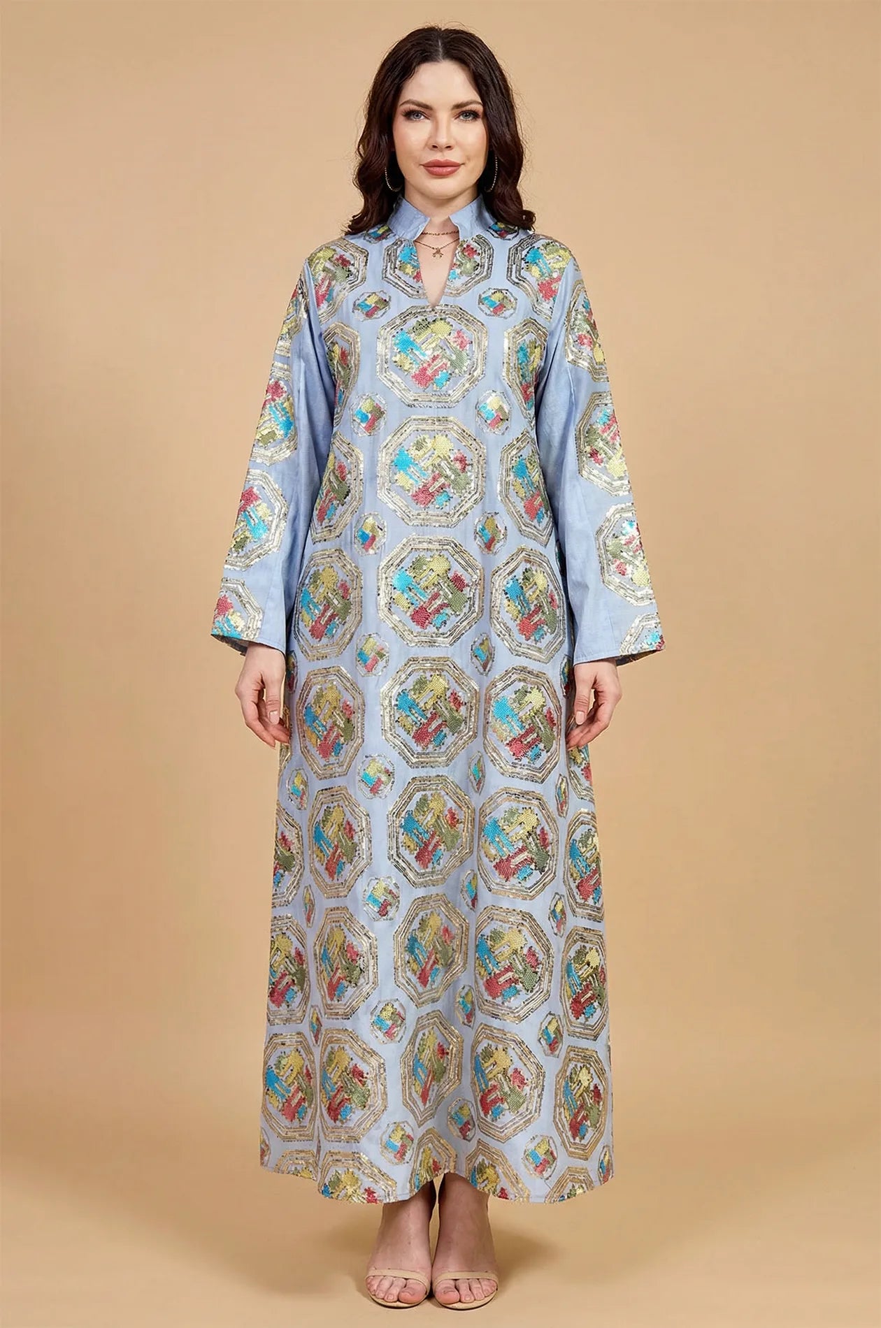 Studio front view of the Sorin light blue mandarin collar kaftan by Naylara, showcasing the symmetrical geometric motifs.