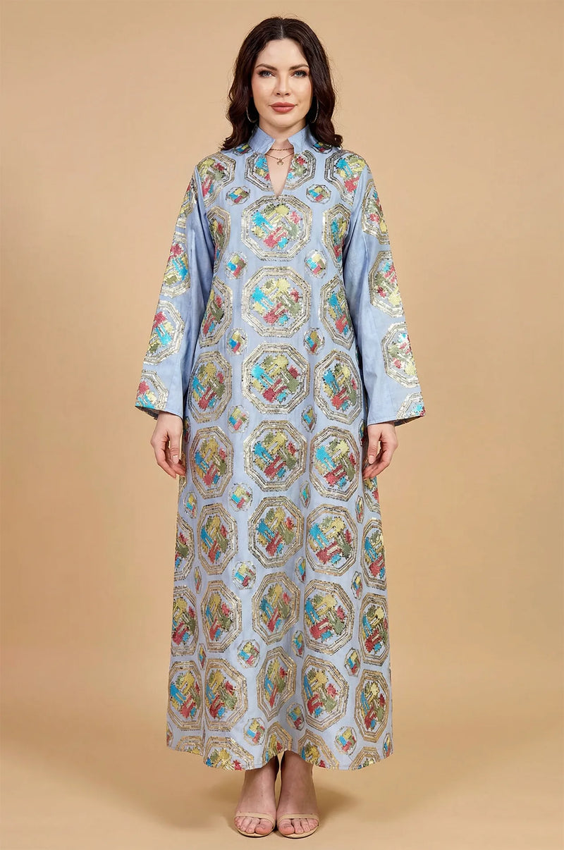 Studio front view of the Sorin light blue mandarin collar kaftan by Naylara, showcasing the symmetrical geometric motifs.