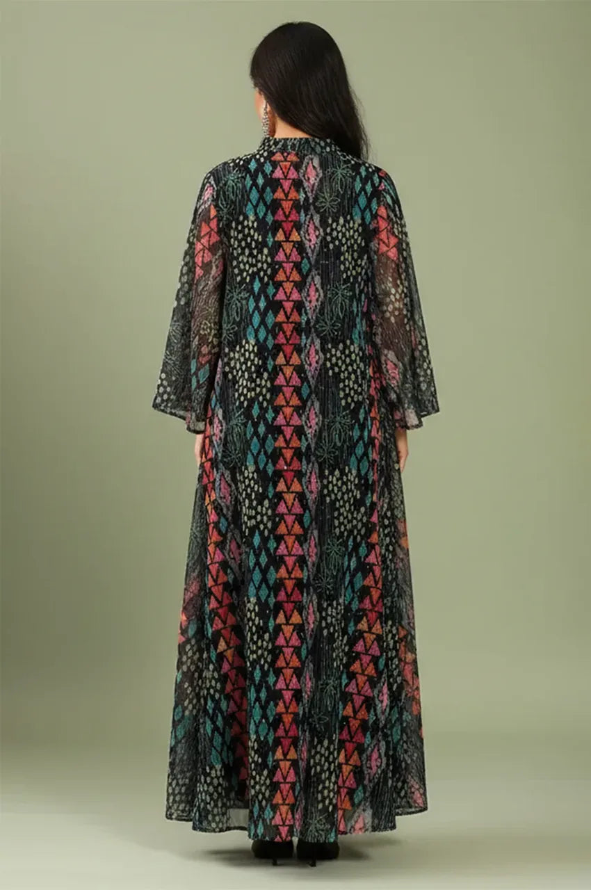 Back view of the Tyrah black geometric print kaftan highlighting the continuous pattern and floor-length drape.