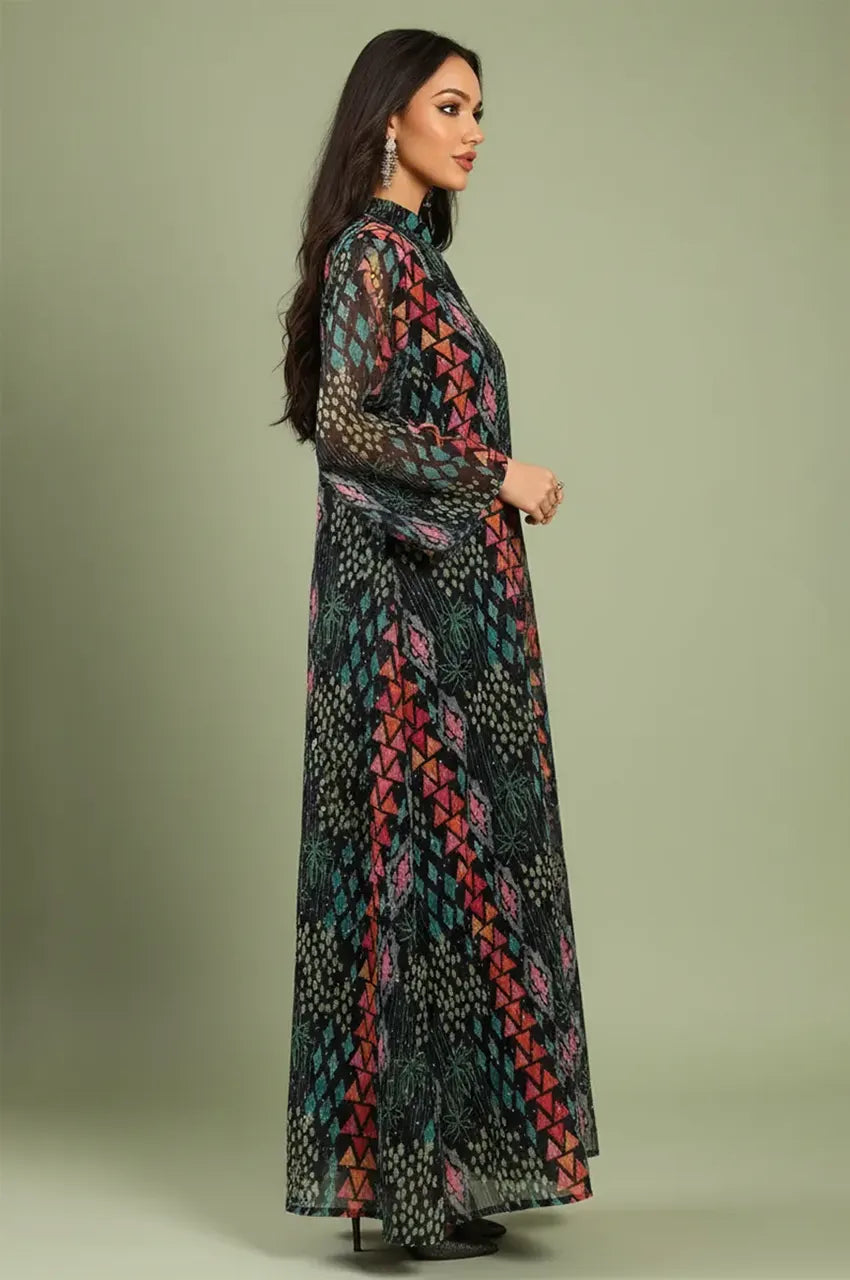 Side profile of the Tyrah black geometric print kaftan showcasing the fluid sleeve construction and long-line fit.