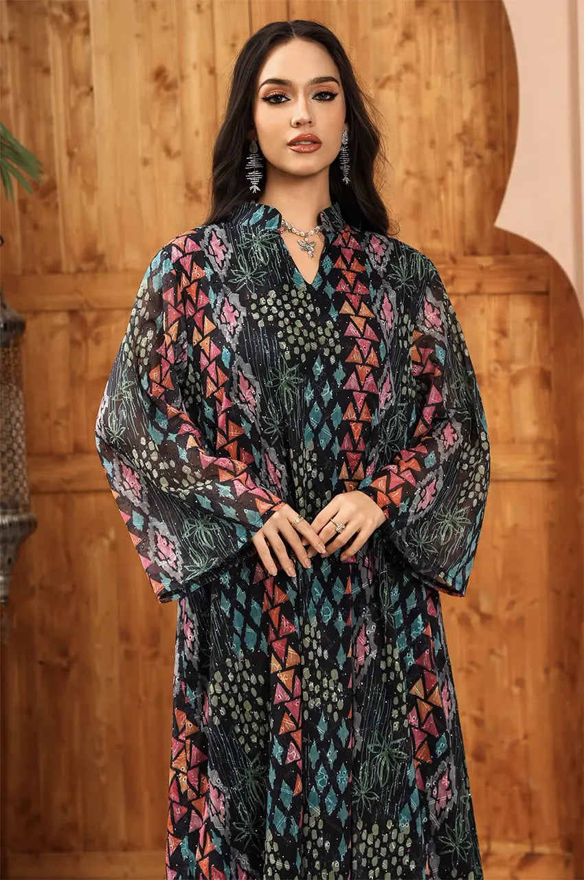 Close-up of the V-neckline and intricate orange and teal motifs on the Tyrah black geometric print kaftan.