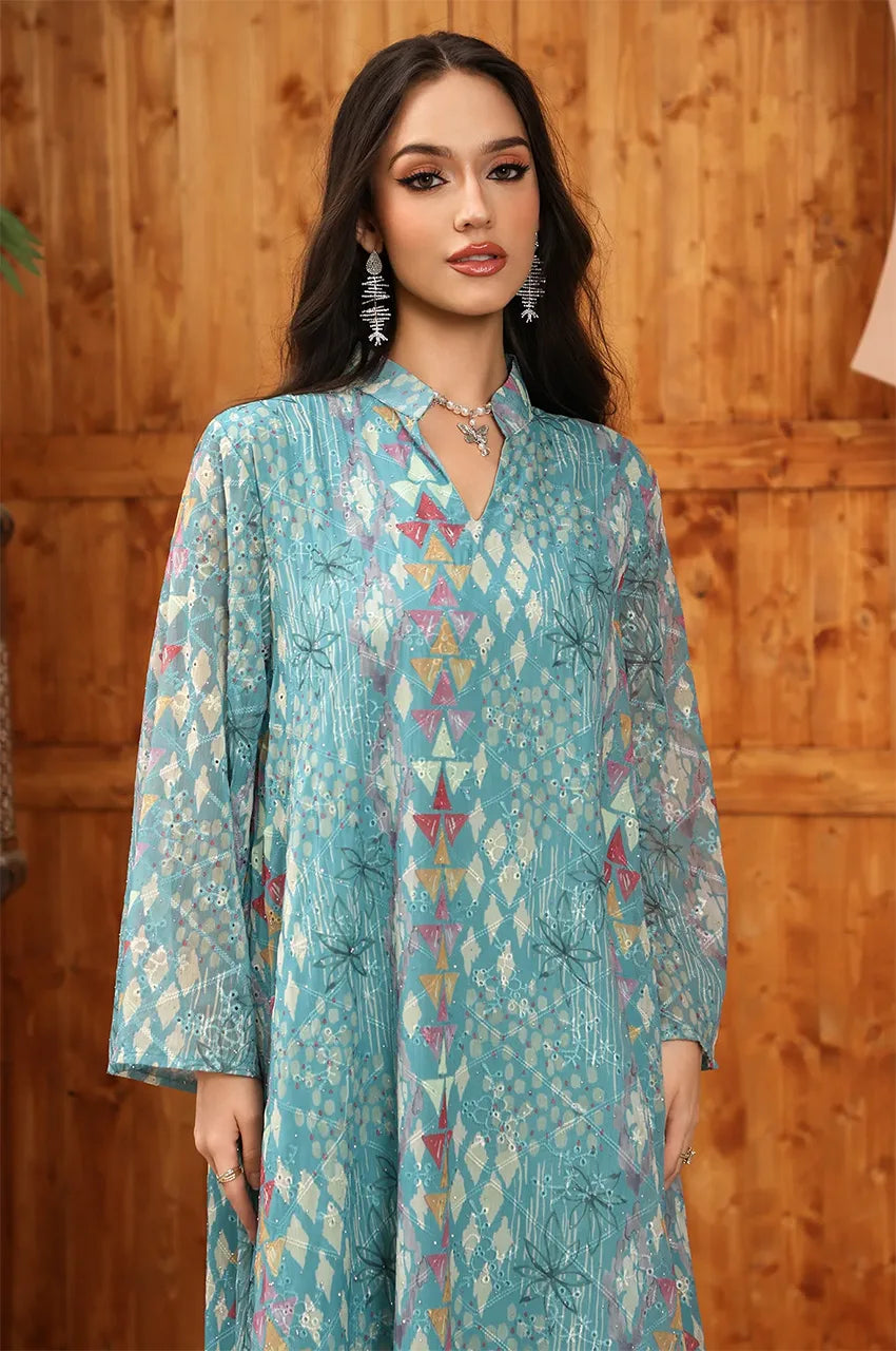 Close-up detail of the V-neckline and diamond motifs on the Tyrah light blue geometric print kaftan.