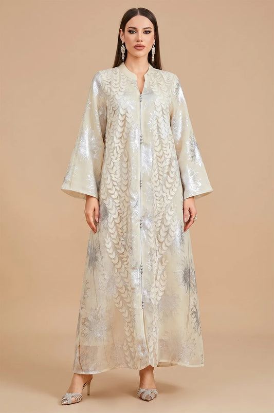 Full front view of Veris white Moroccan kaftan with silver sunburst embroidery.