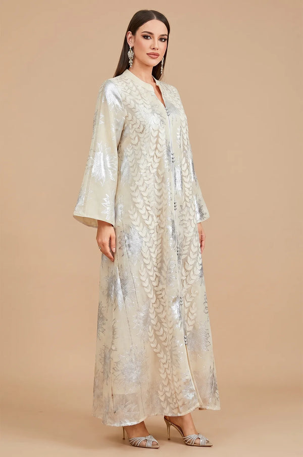 Side profile of Veris white kaftan highlighting the elegant flared bell sleeves.