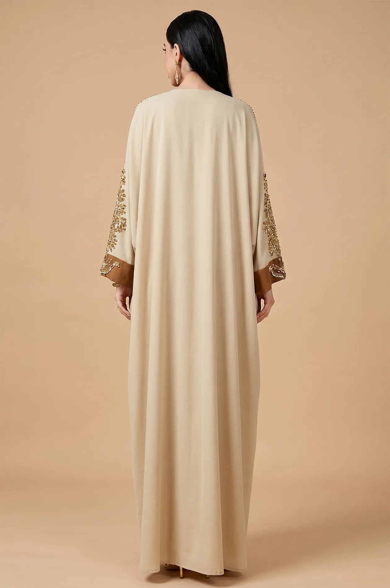 Rear view of the Vetta Khaki kaftan showing the flowing maxi length and drape.