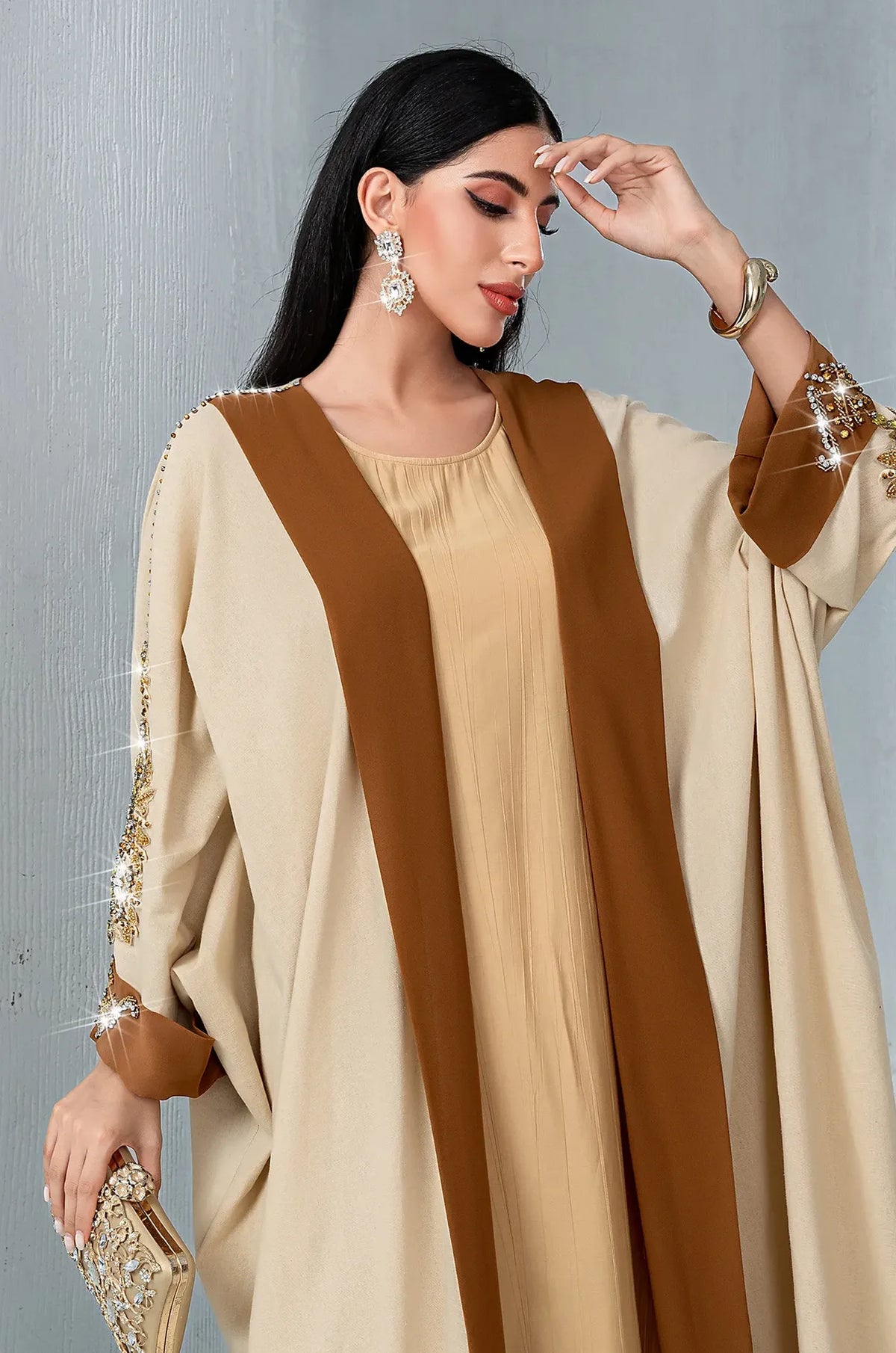 Close-up of the Vetta kaftan neckline and premium fabric texture.