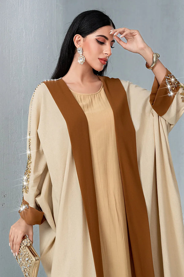 Close-up of the Vetta kaftan neckline and premium fabric texture.