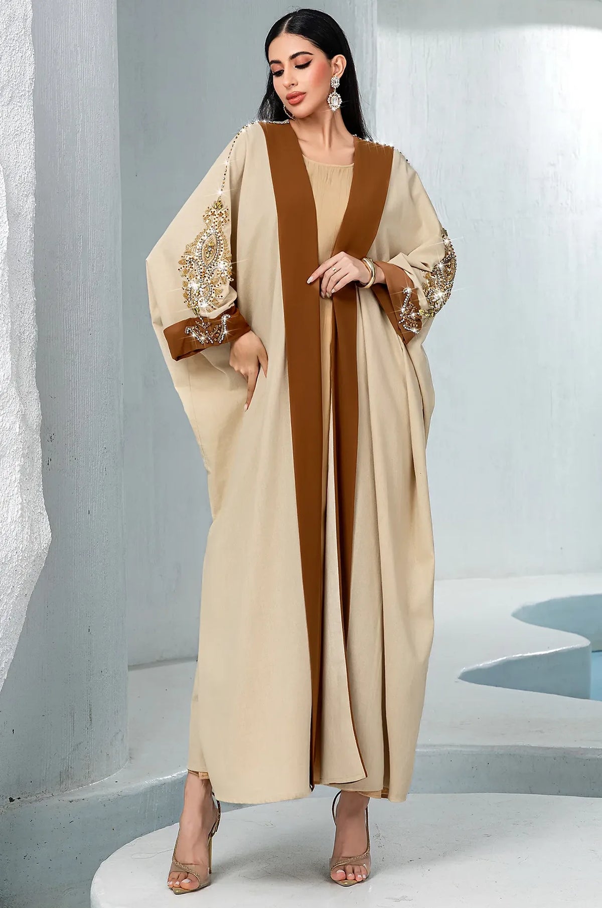 Elegant evening look featuring the Vetta Khaki batwing maxi gown.