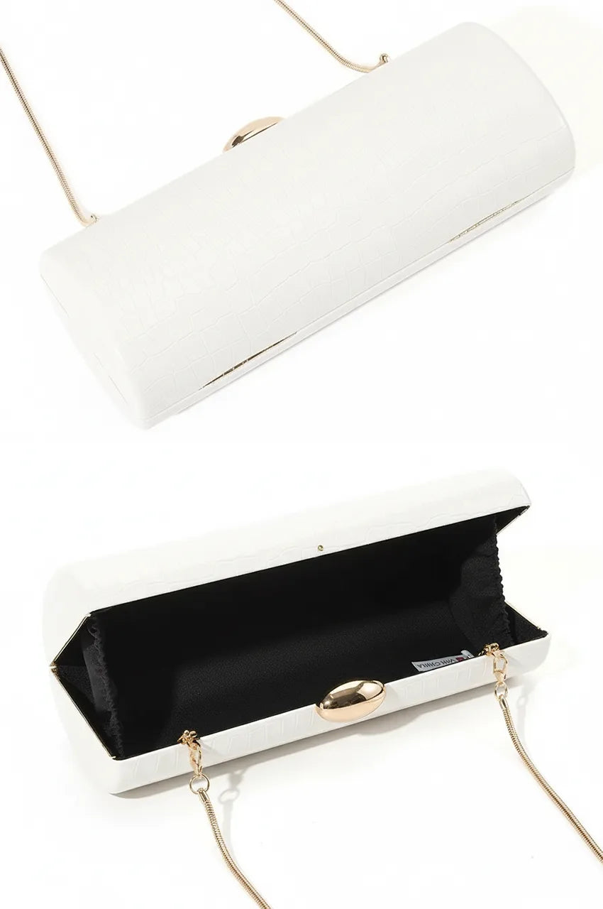 Open view of white hard case clutch showing black fabric lining and detachable gold snake chain.