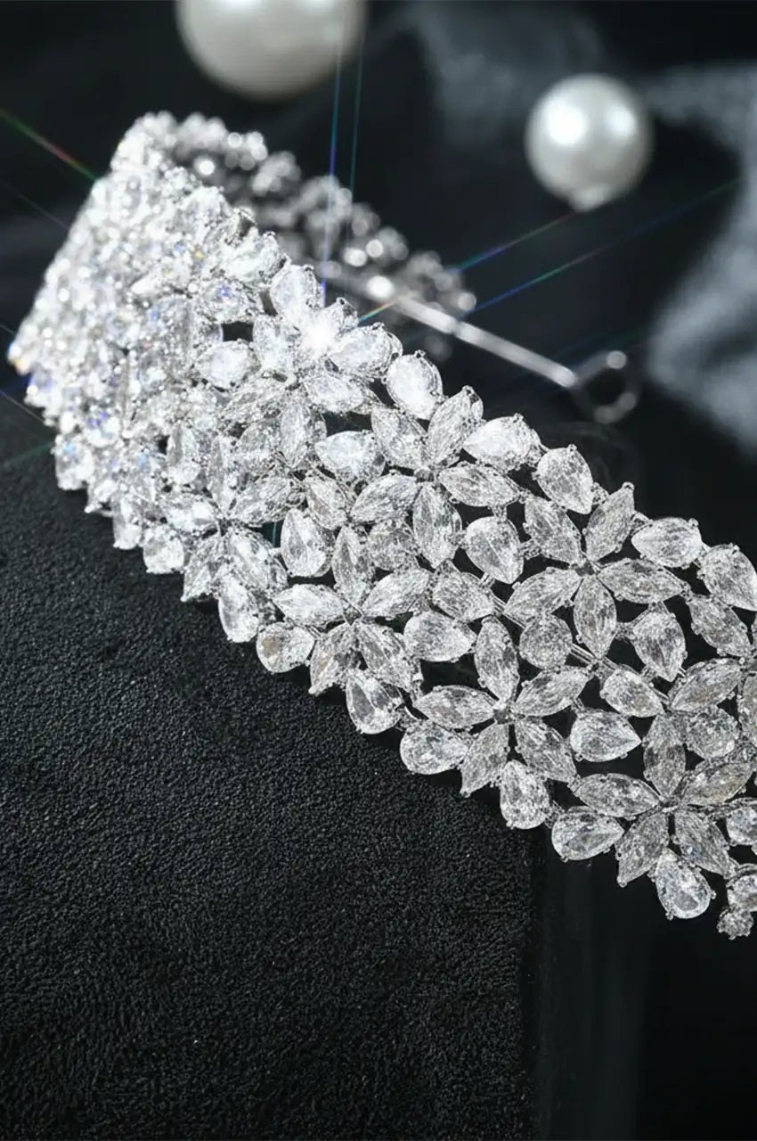 Close-up detail of the Wide Silver-Tone Floral Bridal Headband, showing the precise arrangement of clear teardrop stones.