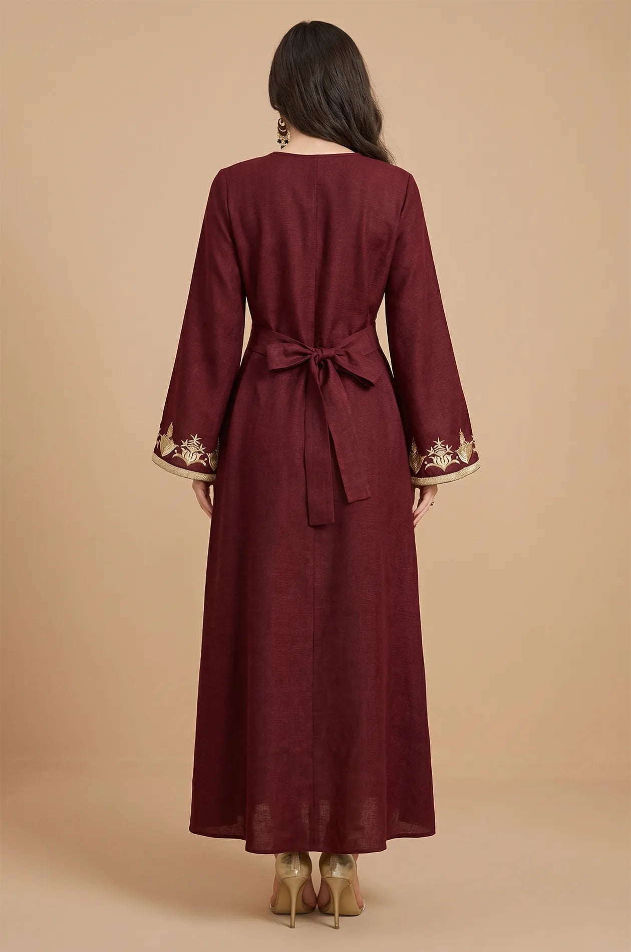 Back view of wine kaftan showing the adjustable tie-belt