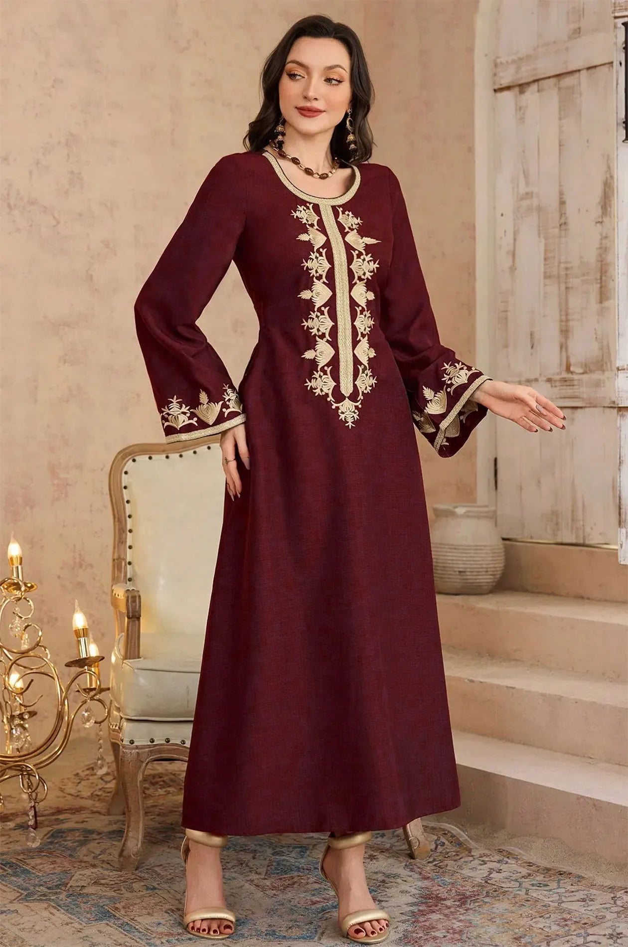 Lelia wine kaftan styled for a formal evening event