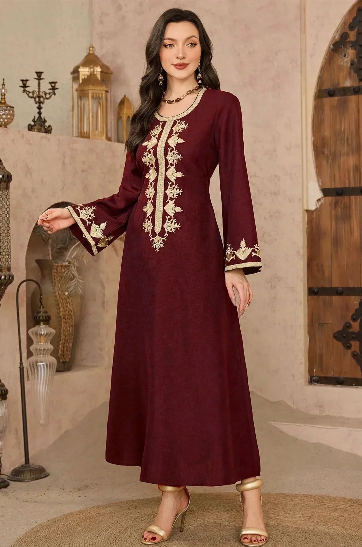 Full body shot of the Lelia kaftan in deep wine red