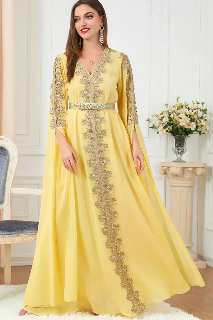 Full-length yellow kaftan dress with gold embroidery and elegant flared sleeves
