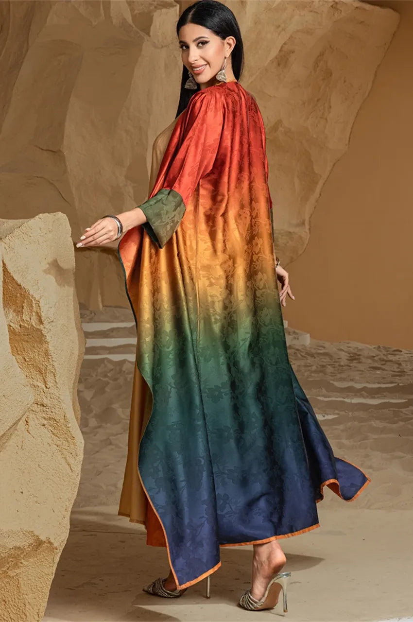 Back drape of ombre kimono kaftan Yumna in desert setting
