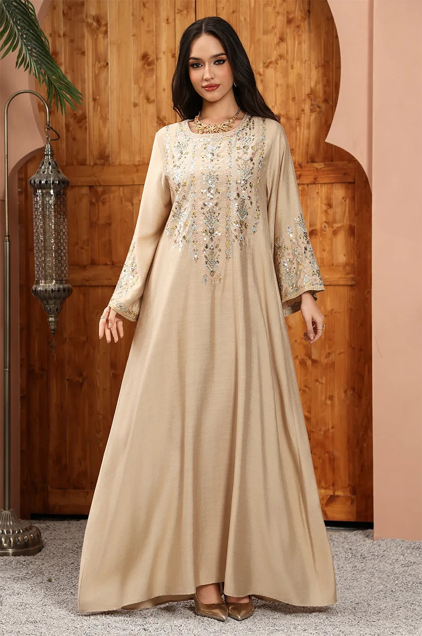 Editorial view of the Zahia beige Saudi kaftan for premium modest fashion.