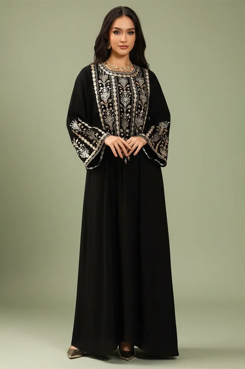 Studio portrait of the Zahia black Saudi kaftan illustrating precision-stitched Sfifa borders.