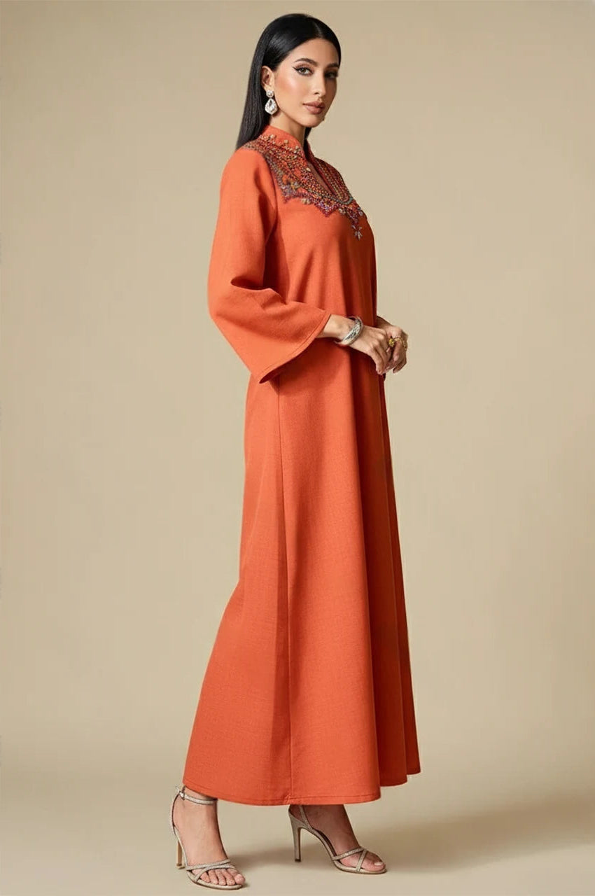 Zahra orange kaftan dress – elegant side profile with embroidery