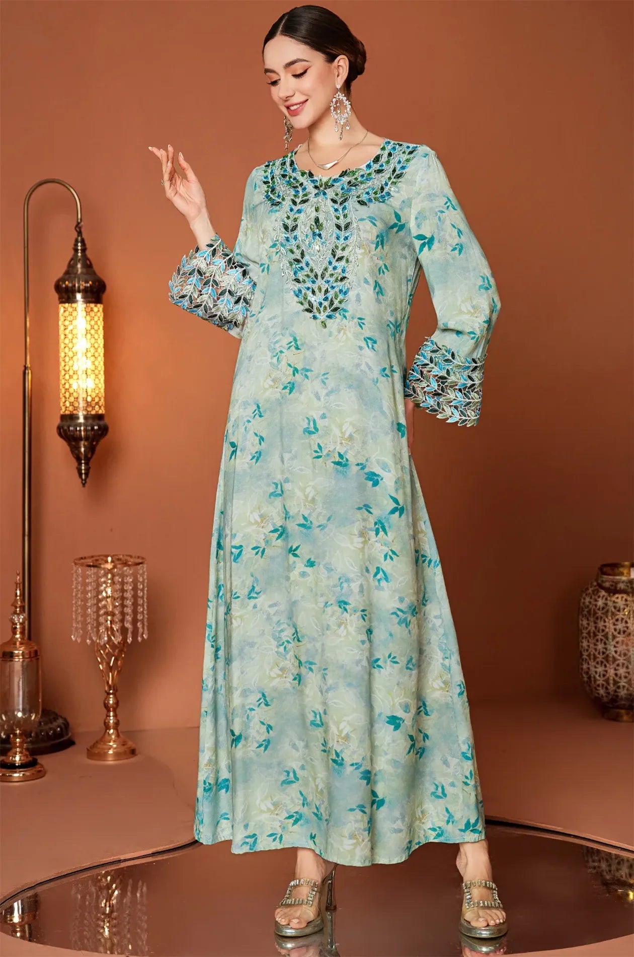 Full body shot of the Zahri Mint Kaftan highlighting the bell sleeves.