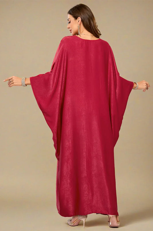 Back view of Zareen Red Kaftan Maxi Dress with long elegant drape