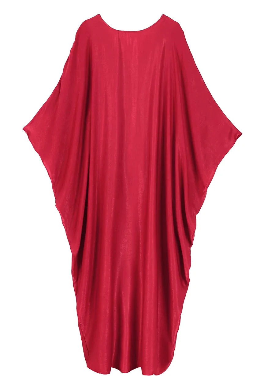 Detailed fabric texture of Zareen Red Kaftan Maxi Dress in shimmering red