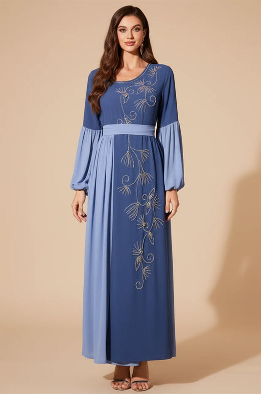 Full length front view of the Zaria pleated kaftan dress by Naylara.