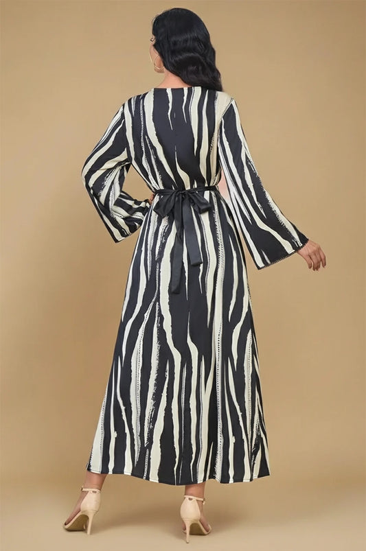 Zayla black and white kaftan back view with tied waist belt