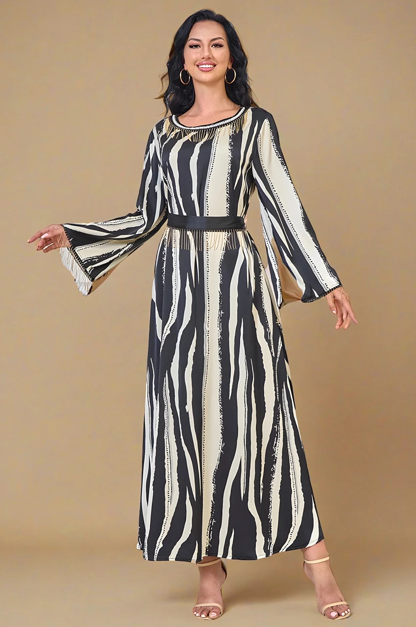 Zayla black and white kaftan angled front view with flowing sleeves