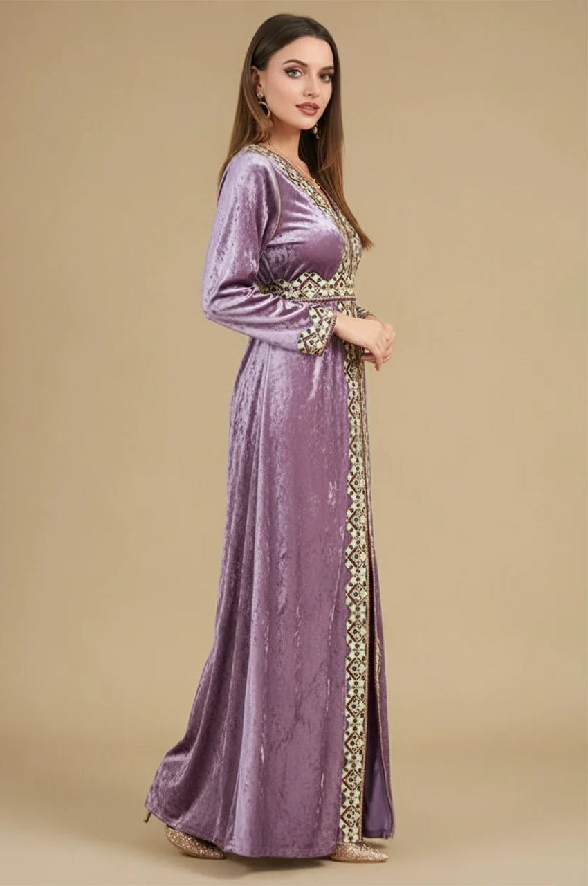 Side profile of Zaynah pink Moroccan velvet kaftan with embroidered trim