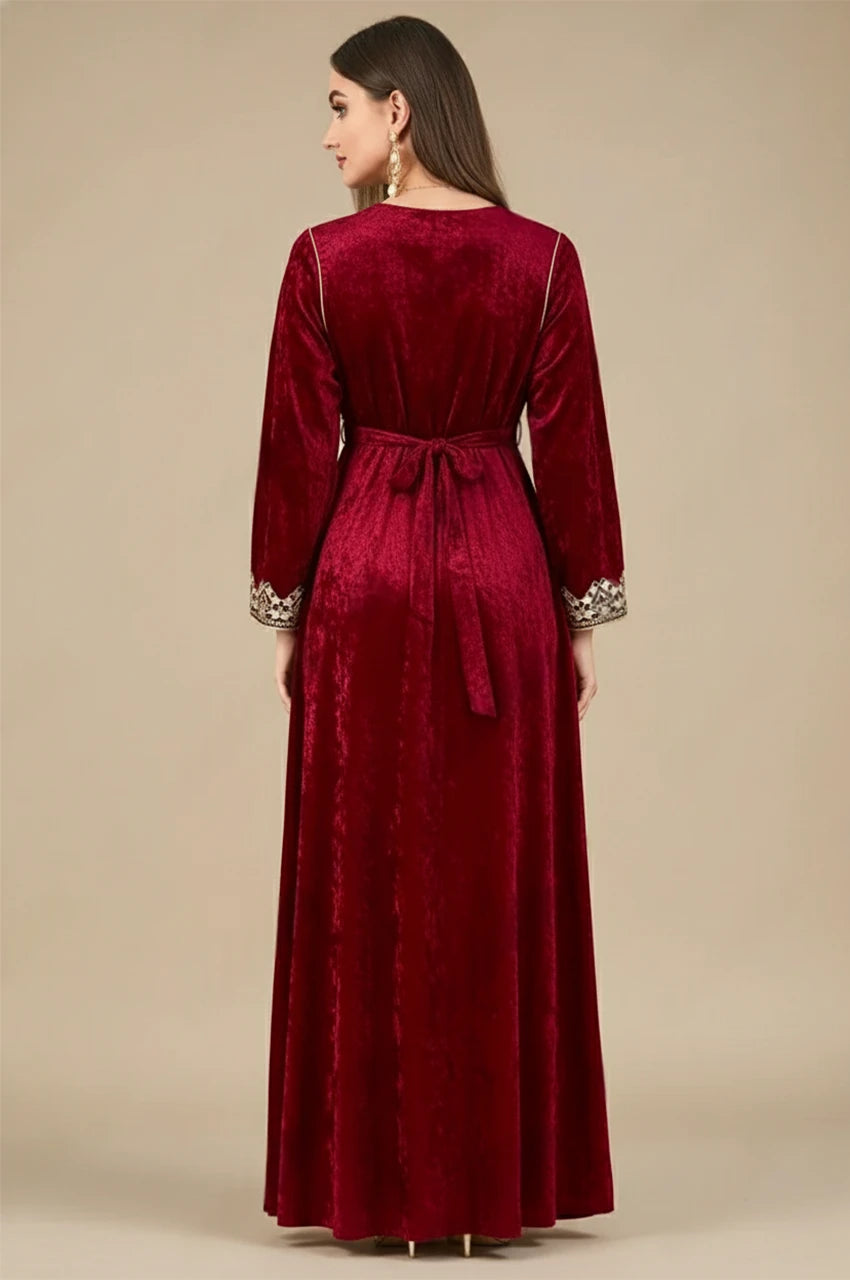 Back view of Zaynah red Moroccan velvet kaftan with belt and embroidered cuffs