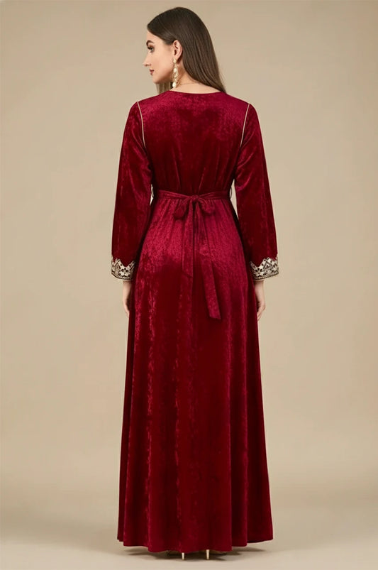 Back view of Zaynah red Moroccan velvet kaftan with belt and embroidered cuffs