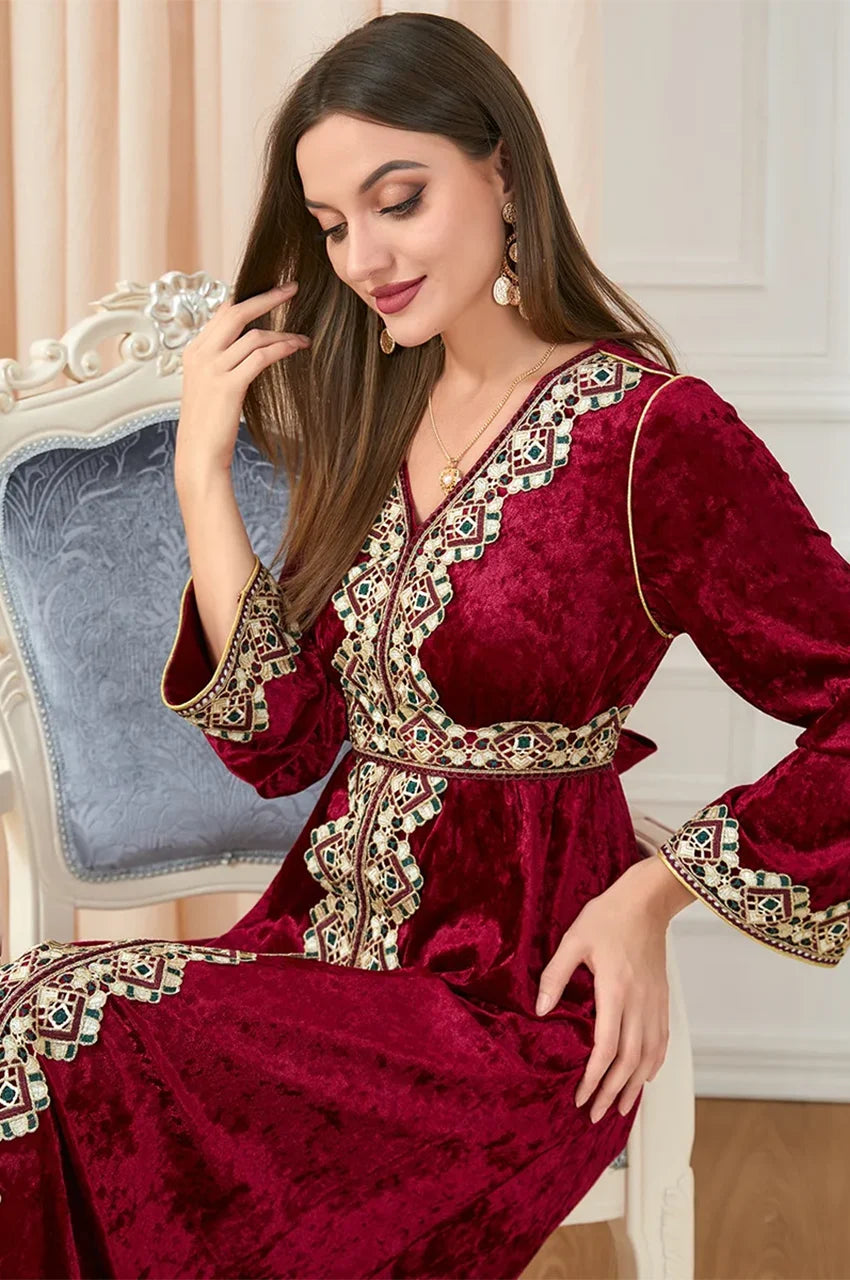 Close-up of Zaynah red Moroccan velvet kaftan with intricate embroidery