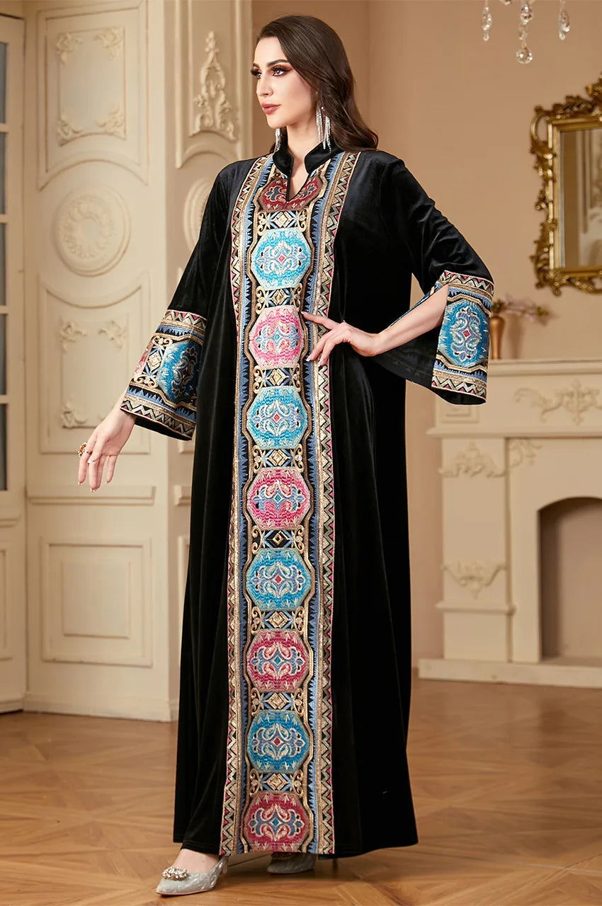 Detail shot of the heavy multi-color embroidery on the black velvet sleeve cuffs.