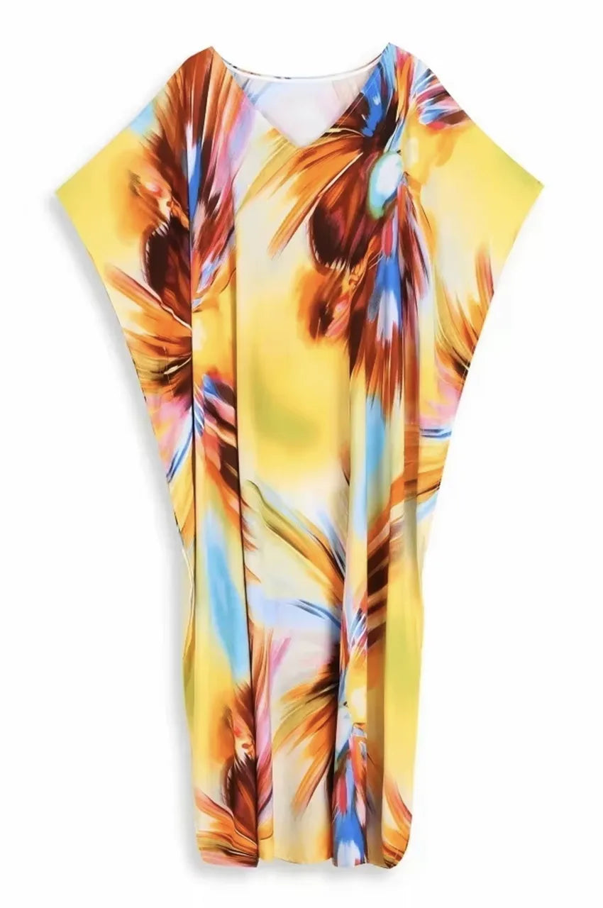 Flat lay of Zyra psychedelic kaftan showing abstract multicolor design